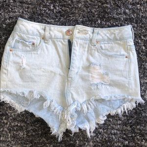 Divided light wash high waisted jean shorts